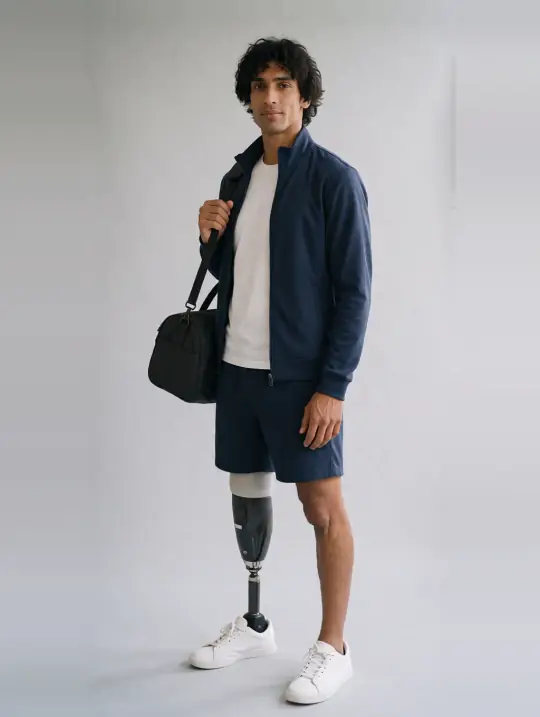 Dev, an A Pose Studio AI model: South Asian heritage, early 30s, prosthetic leg